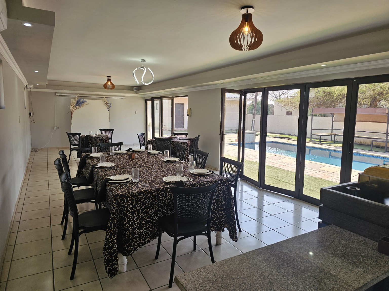 Wide view of the pool house seating area