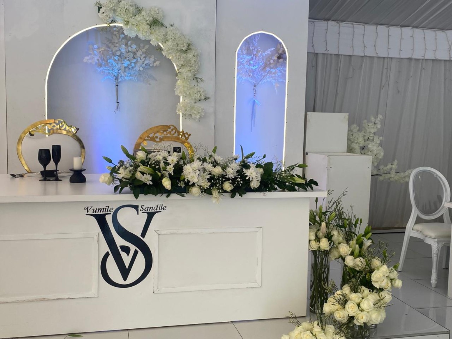 Wedding head table and floral decor